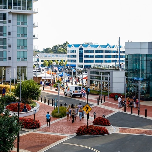 Aerial view of people using red brick crosswalks