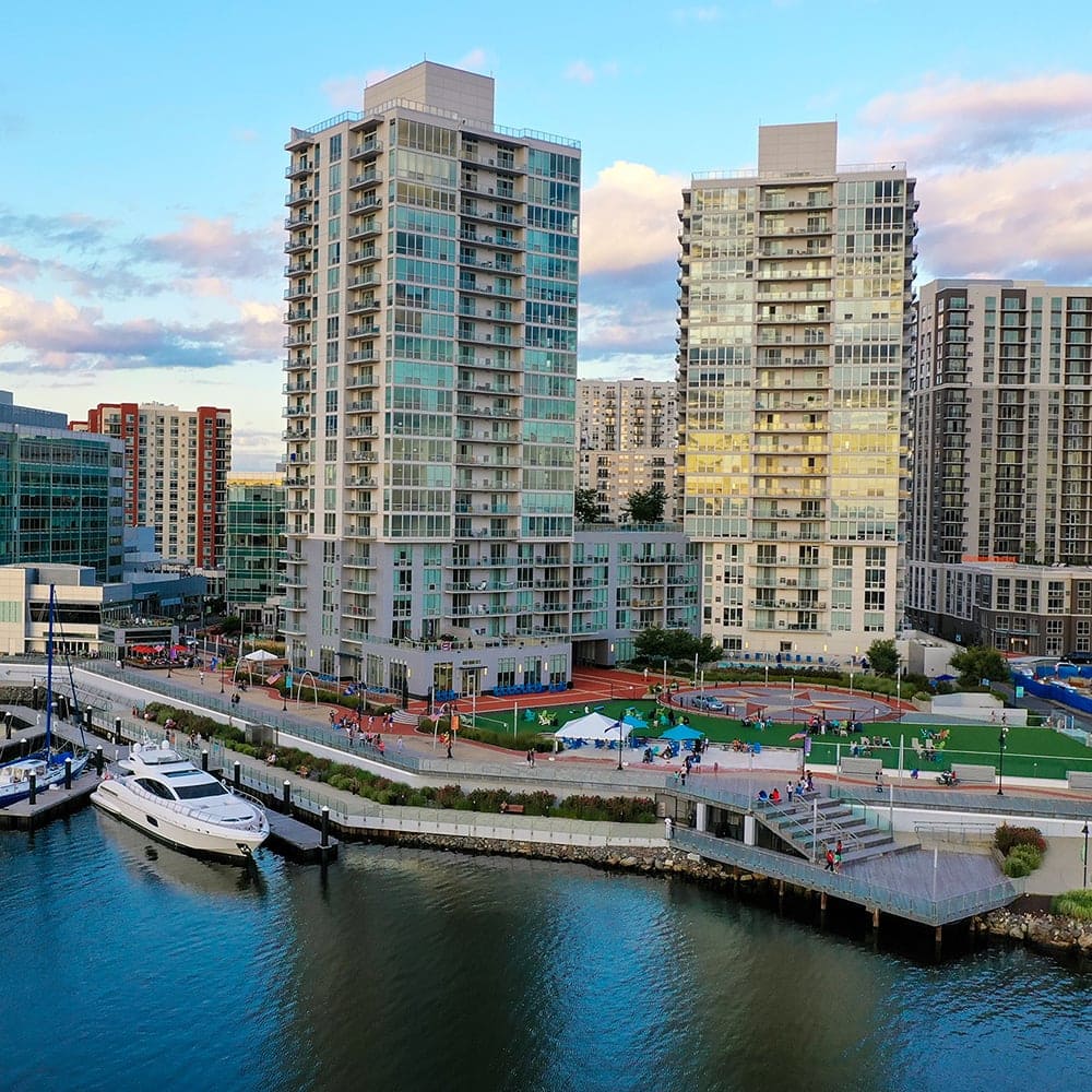 Multi-story commercial buildings overlooking a marina