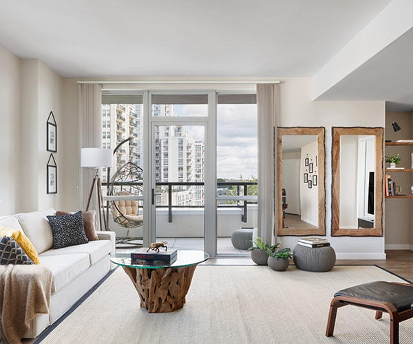White and tan living room of upper level apartment